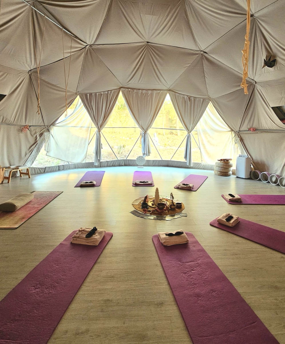 A calm geodesic dome prepared for a shared session